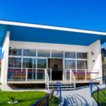 Imagem da entrada principal da Rede Village Care